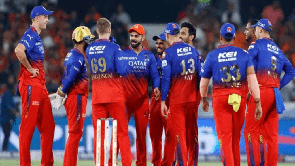 RCB players celebrating a wicket during the match